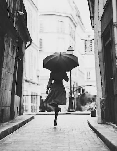 Woman with umbrella, Paris. Photographer: Kalle Gustafsson.